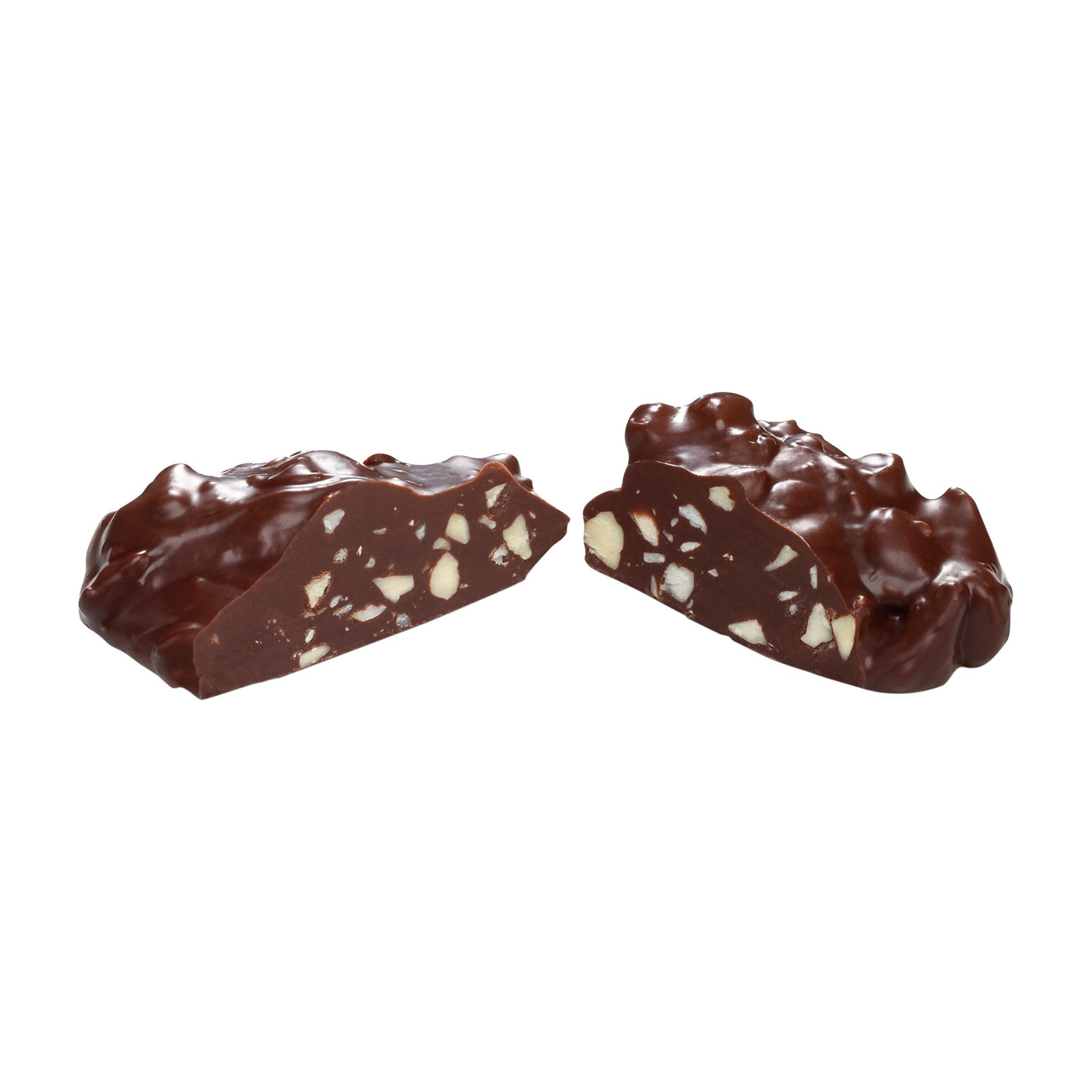 Two pieces of chocolate nut clusters are shown, one cut in half to reveal a mixture of chopped nuts inside a smooth, glossy layer of dark chocolate, all on a white background.