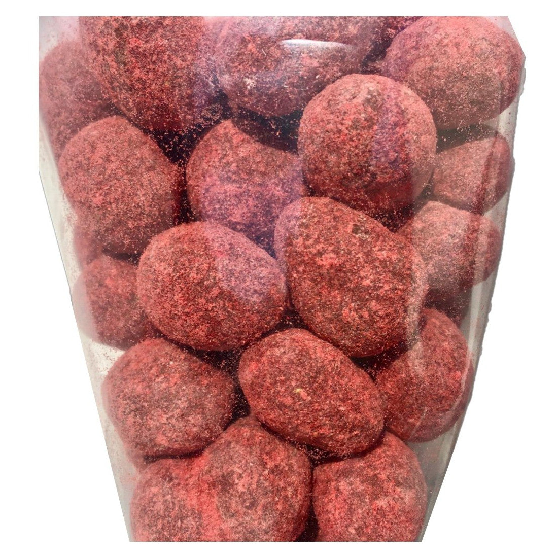 A close-up view of a clear plastic bag filled with round, red, sugar-coated candies or nuts, tightly packed together.