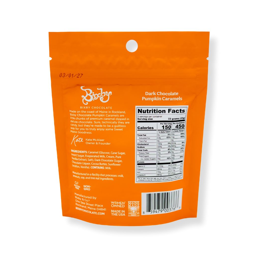 Back of an orange Bixby Chocolates Pumpkin Caramels | 6 Pouches bag displays nutrition facts, ingredients, a QR code, barcode, company info, and a Women Owned label—ideal for fans of fall treats.