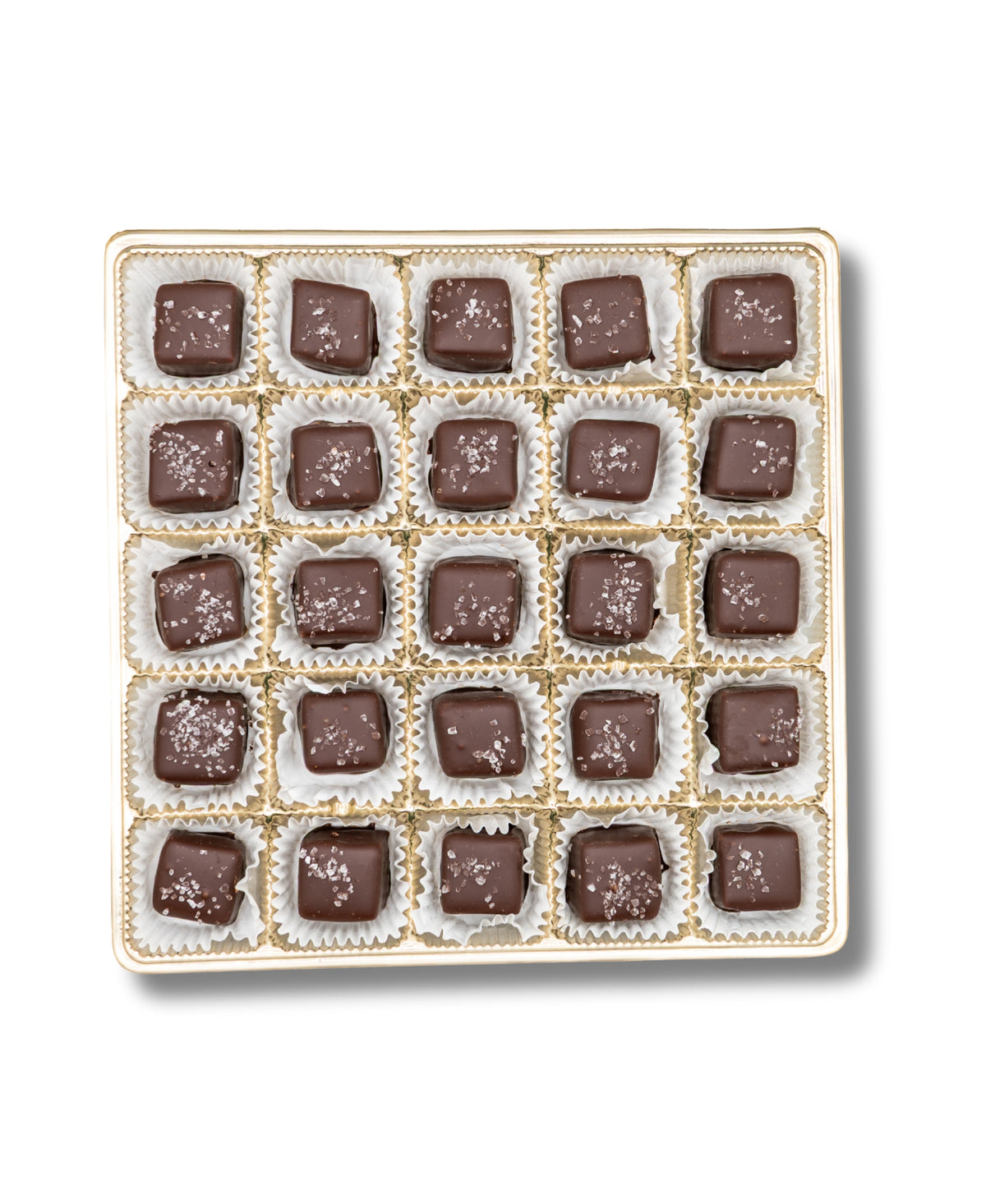 The Bixby Chocolates Chocolate Sea Salted Caramels Gift Box features 25 artisanal square caramels with coarse salt, each in a white paper cup, and elegantly arranged in a 5x5 grid—perfect for sea salted caramel lovers.