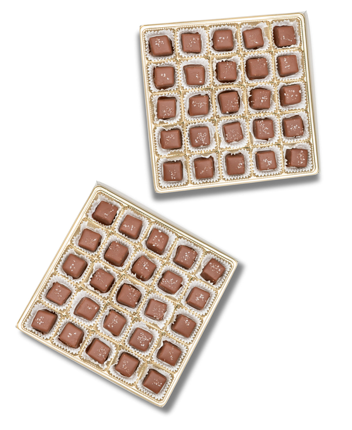 Two open Bixby Chocolates Chocolate Sea Salted Caramels Gift Boxes, each caramel in a gold tray compartment, are displayed against a white background.