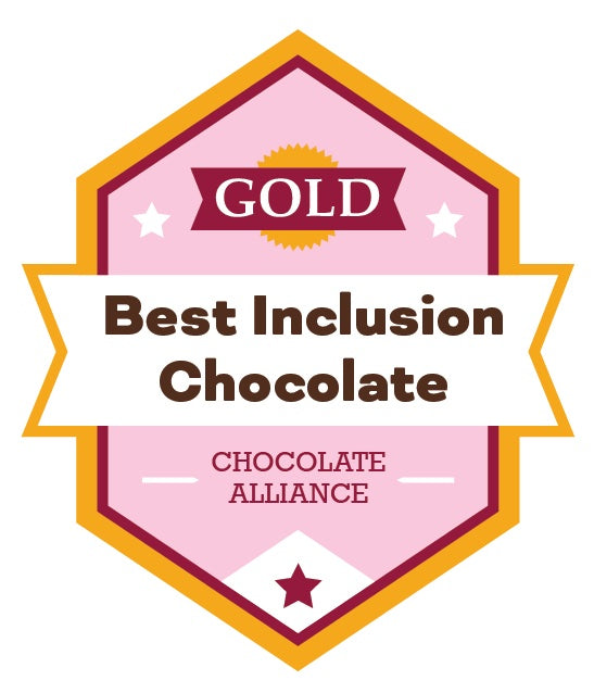 A pink and gold badge reads GOLD Best Inclusion Chocolate with CHOCOLATE ALLIANCE below, featuring stars and a ribbon design.