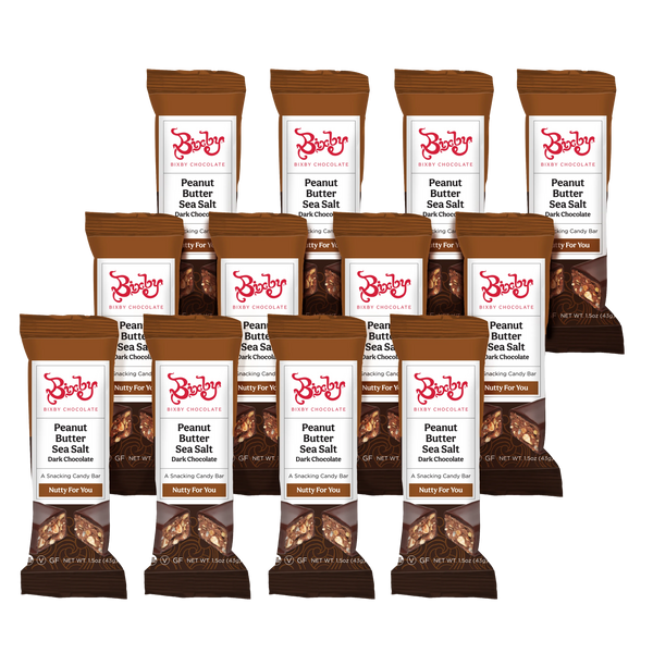 Twelve Nutty for You® bars by Bixby Chocolates—dark chocolate with crunchy peanut butter and Maine sea salt—are wrapped in brown packaging and arranged in three rows against a white background.