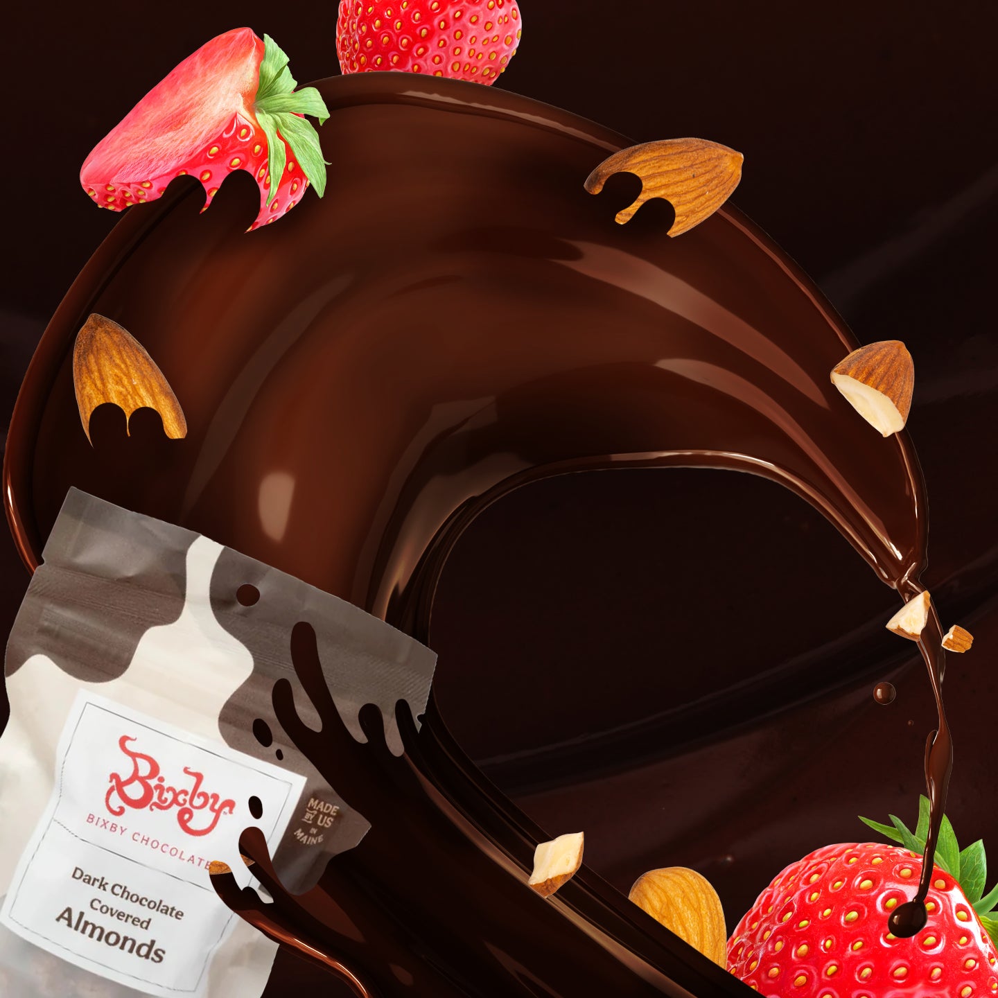 A swirl of glossy dark chocolate with floating almonds and strawberries surrounds a partially visible bag labeled “Dark Chocolate Covered Almonds” by Bixby Chocolate.