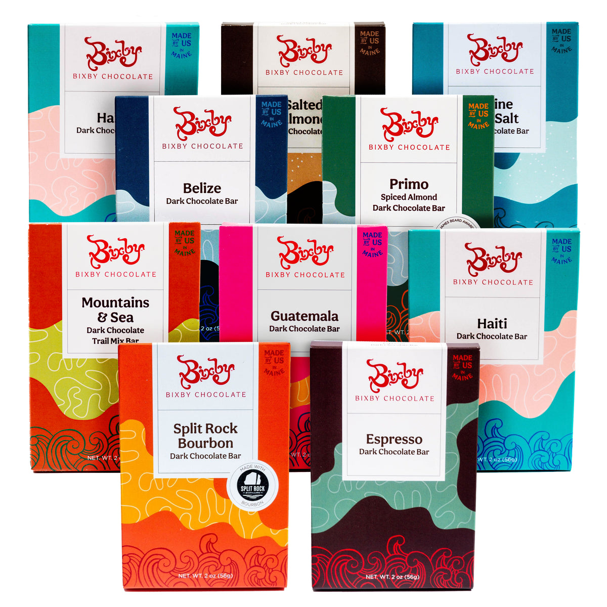 Ten vibrant Bixby Chocolate Bars Variety Pack boxes are neatly arranged, each showcasing unique designs and flavors like Belize, Primo, Sea Salt, Mountains & Sea, Guatemala, Haiti, Split Rock Bourbon, and Espresso.