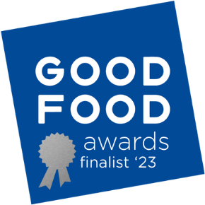 Blue square graphic tilted at an angle with the text GOOD FOOD awards finalist 23 and a silver ribbon icon in the lower left corner.