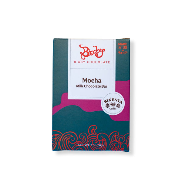 A Mocha Milk Chocolate Bar by Bixby Chocolates, featuring teal and pink wave packaging and crafted with artisanal coffee. Made in Maine, USA. Net weight: 2 oz (56g).