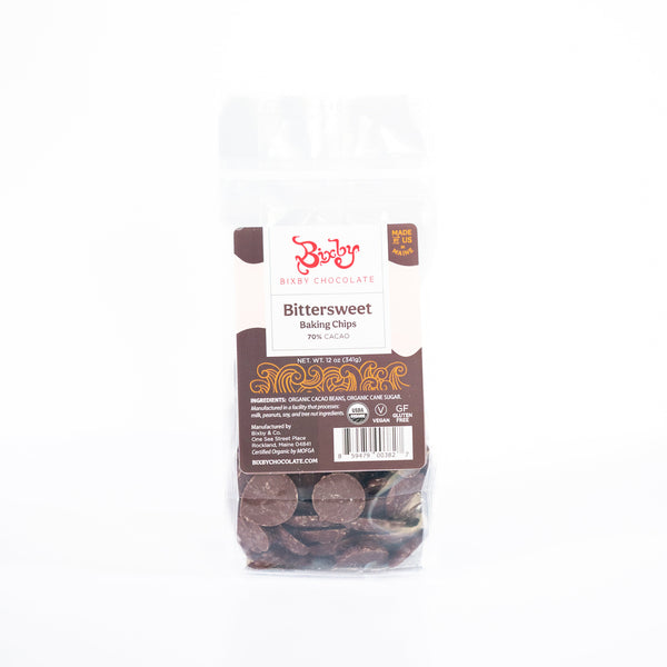 A clear bag of Bixby Chocolates Baking Chocolate Chips (70% cacao) features a brown and white label, displaying the chocolate chips inside against a white background.