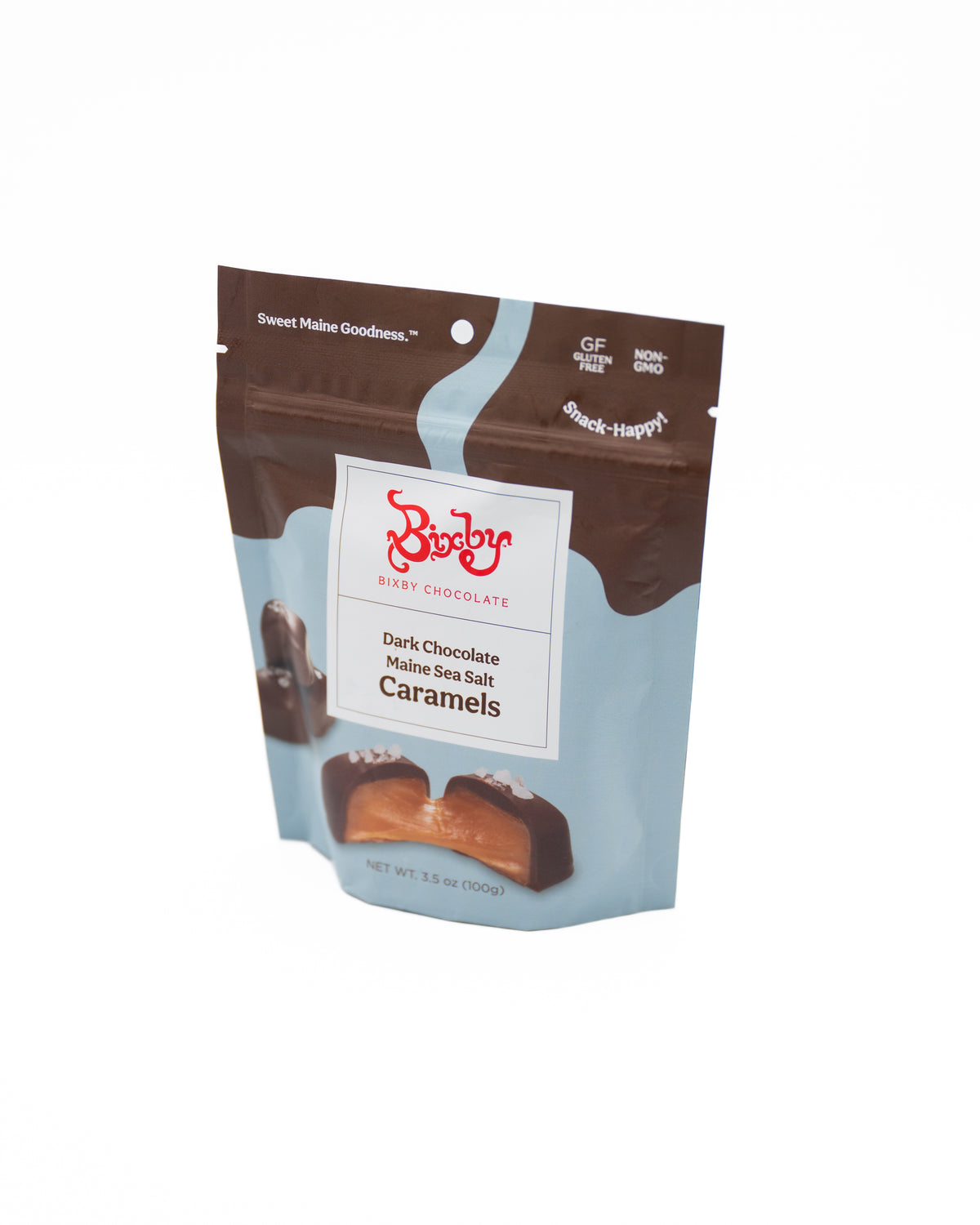 A blue and brown bag of Bixby Chocolates Dark Chocolate Sea Salted Caramels--6 Pouches stands upright, featuring the Bixby logo and images of chocolate-coated caramels on the front.