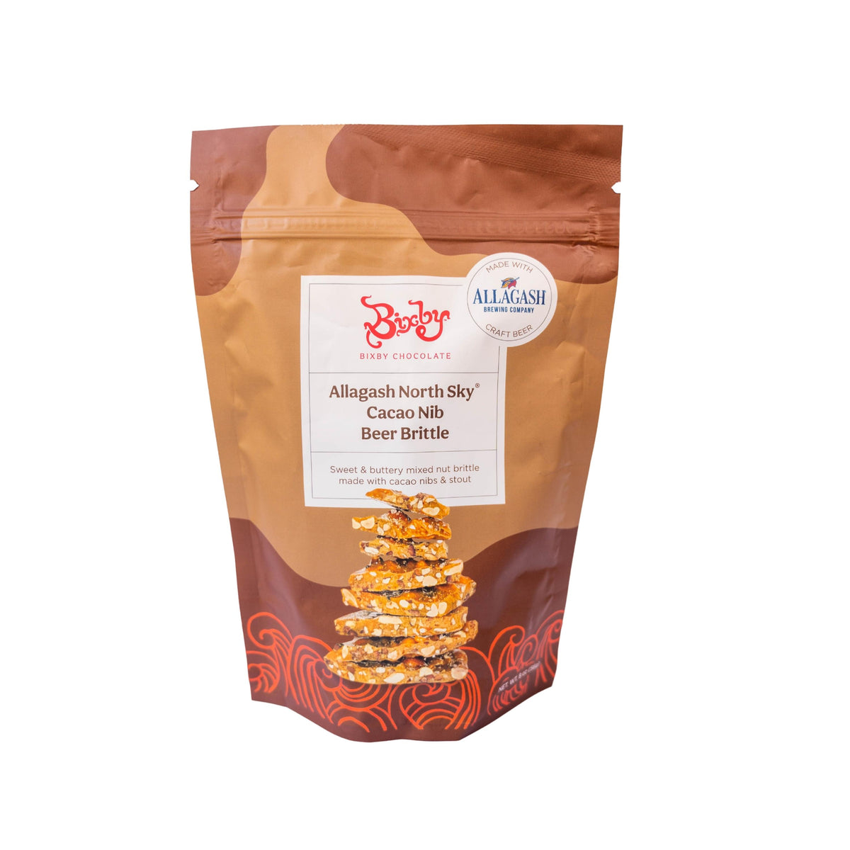 A brown bag labeled Bixby Chocolates Allagash Beer Brittle, showing a stack of nut brittle pieces and highlighting brittle crafted with Allagash beer, chocolate notes, and Maine sea salt.
