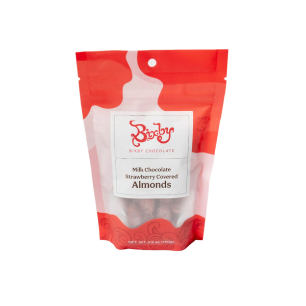 A red and white resealable pouch labeled Bixby Chocolates: Strawberries & Cream Almonds, with some almonds visible through a clear window at the bottom.
